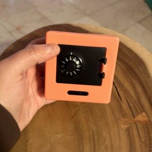 Plastic coral pink miniature vault